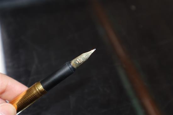 A Dunhill gold-plated fountain pen, 14ct gold nib, a miniature guilloche enamel propelling pencil and eight other items